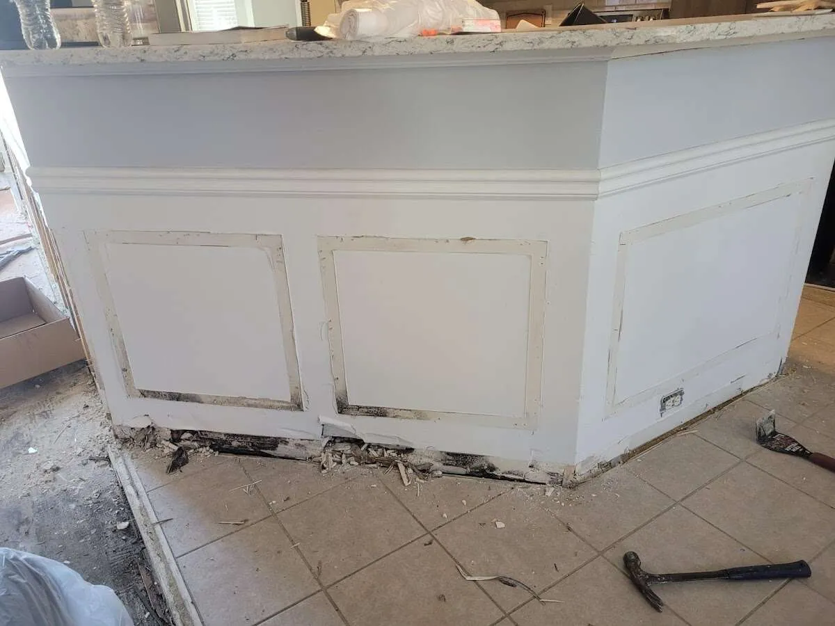 Water damage and mold on kitchen during Storm Damage Restoration in Dedham